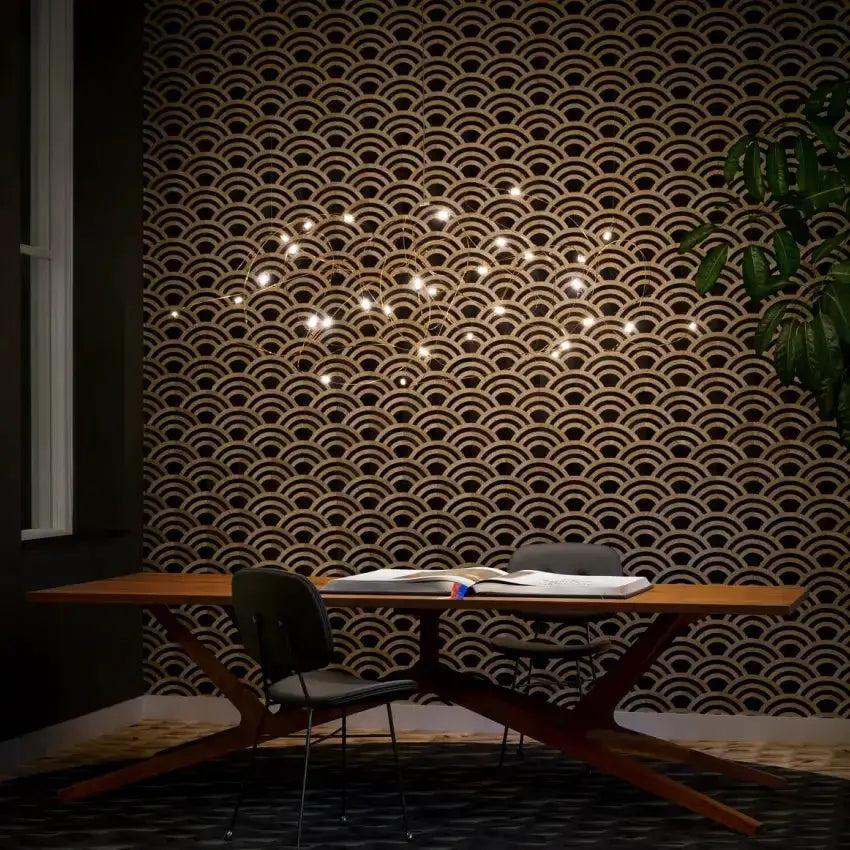 Chandelier Decorbites minimal LED firefly kitchen pendant light with warm bulbs above table on Tampa Home & Garden Store