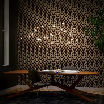 Chandelier Decorbites minimal LED firefly kitchen pendant light with warm bulbs above table on Tampa Home & Garden Store