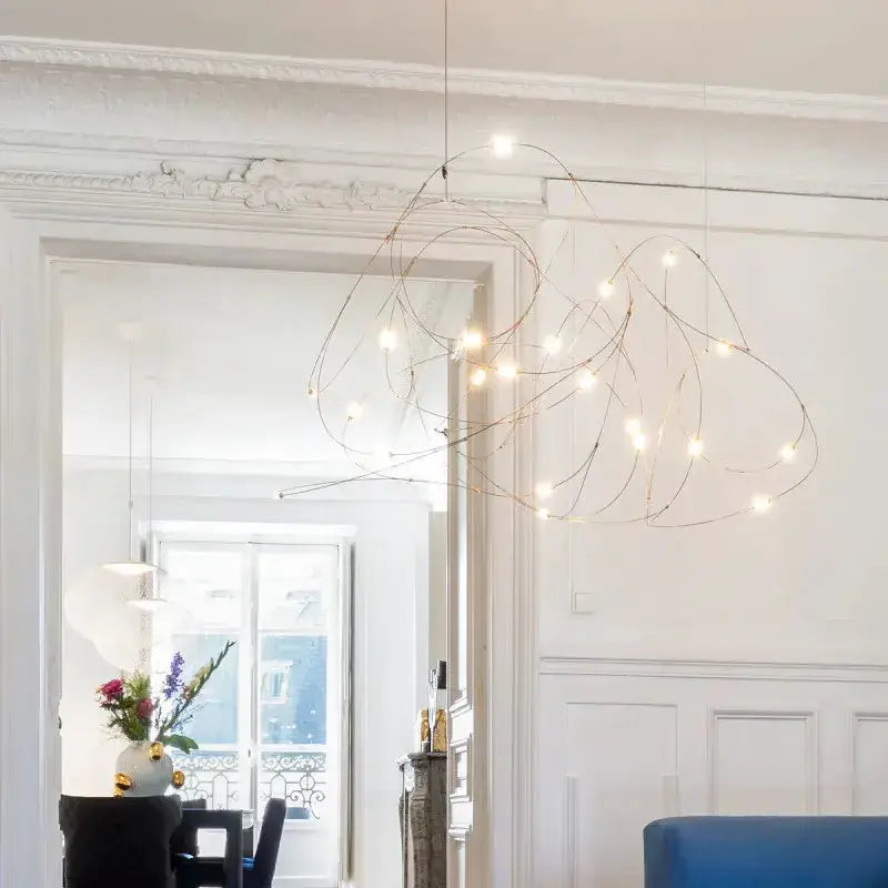 Chandelier Decorbites modern LED firefly pendant light with gold wire arms and warm bulbs on Tampa Home & Garden Store