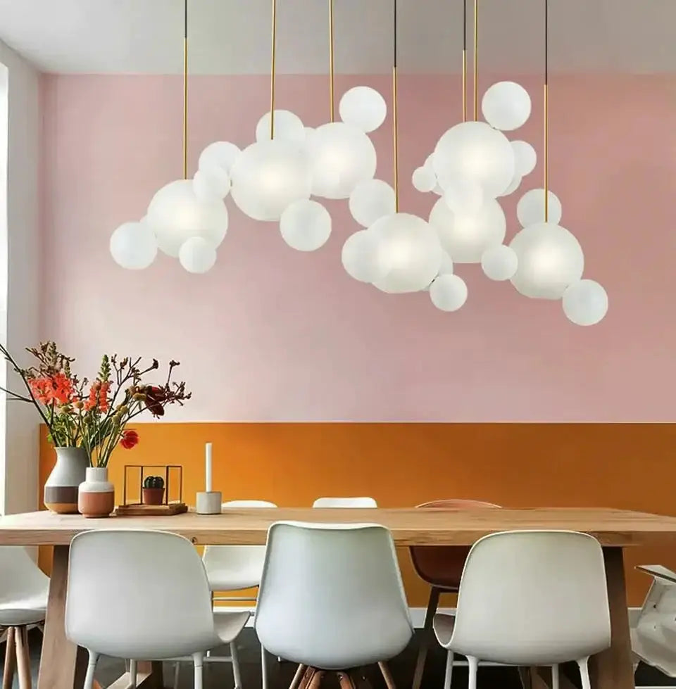 Chandelier Decorbites adjustable LED bubble chandelier with frosted globes and gold cords on Tampa Home & Garden Store