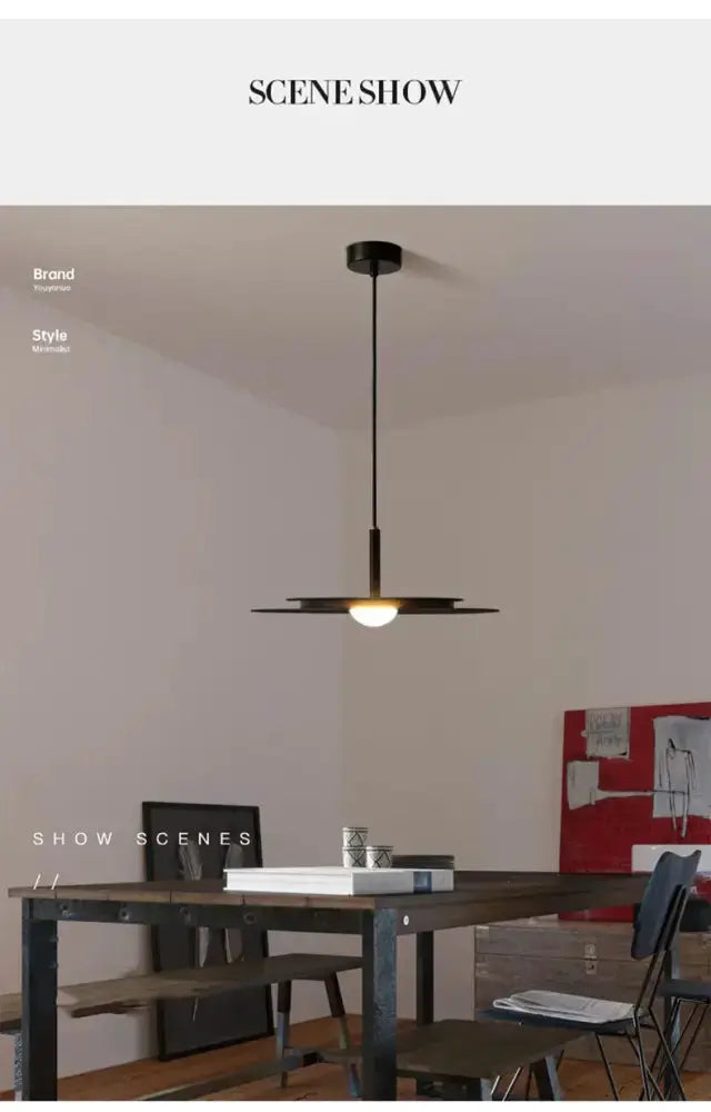 Minimalist black flying saucer pendant chandelier by Decorbites over a dining table on Tampa Home & Garden Store