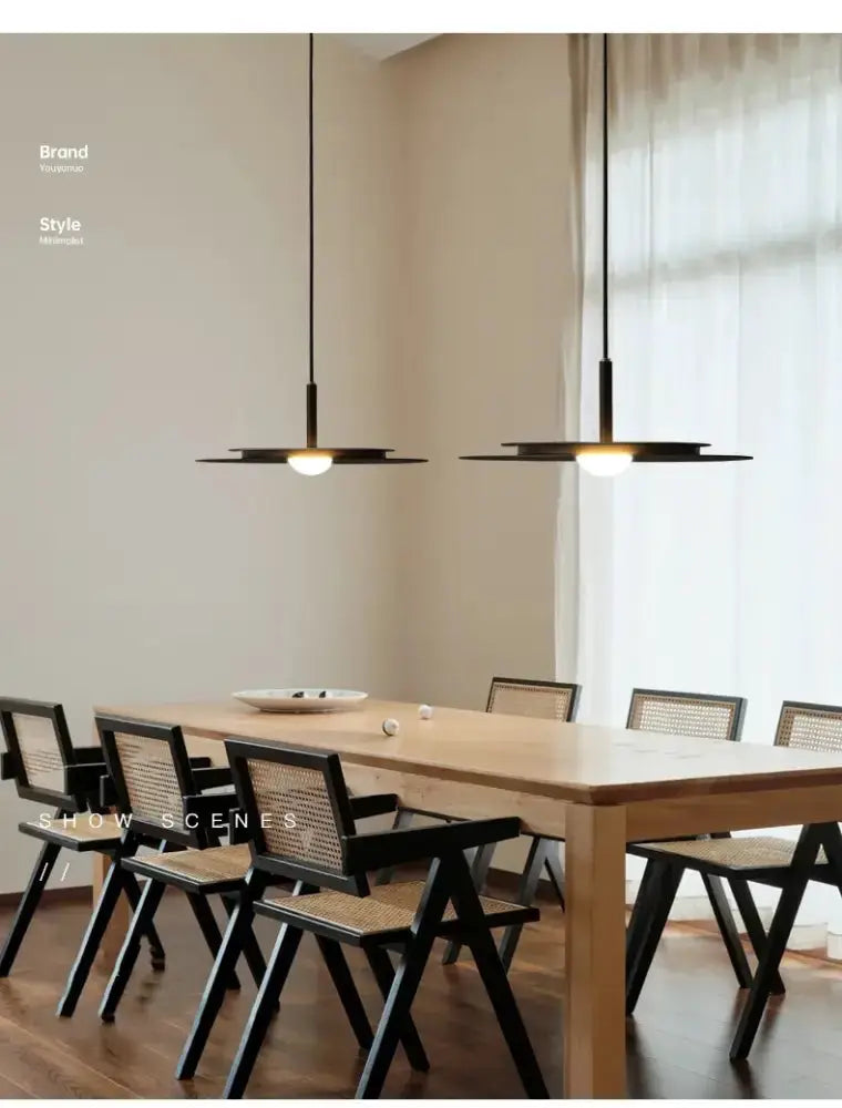 Minimalist black flying saucer pendant lights 2 fixtures warm bulbs over dining table Decorbites on Tampa Home & Garden Store
