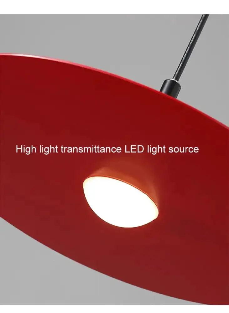 Red flying saucer pendant light with LED glow for dining room on Tampa Home & Garden Store