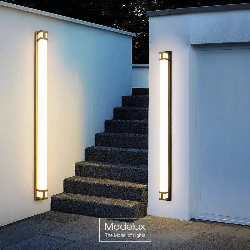 Decorbites outdoor wall lamp sconce; black metal with gold trim, LED tubes, 2 fixtures on Tampa Home & Garden Store