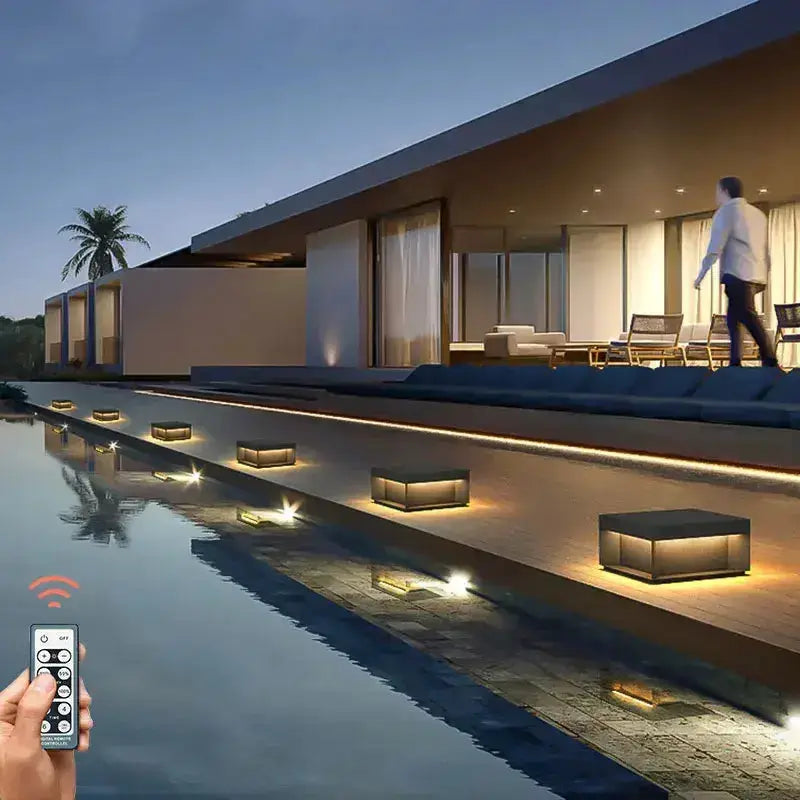 Decorbites black square solar LED pillar lights along courtyard steps with remote control on Tampa Home & Garden Store