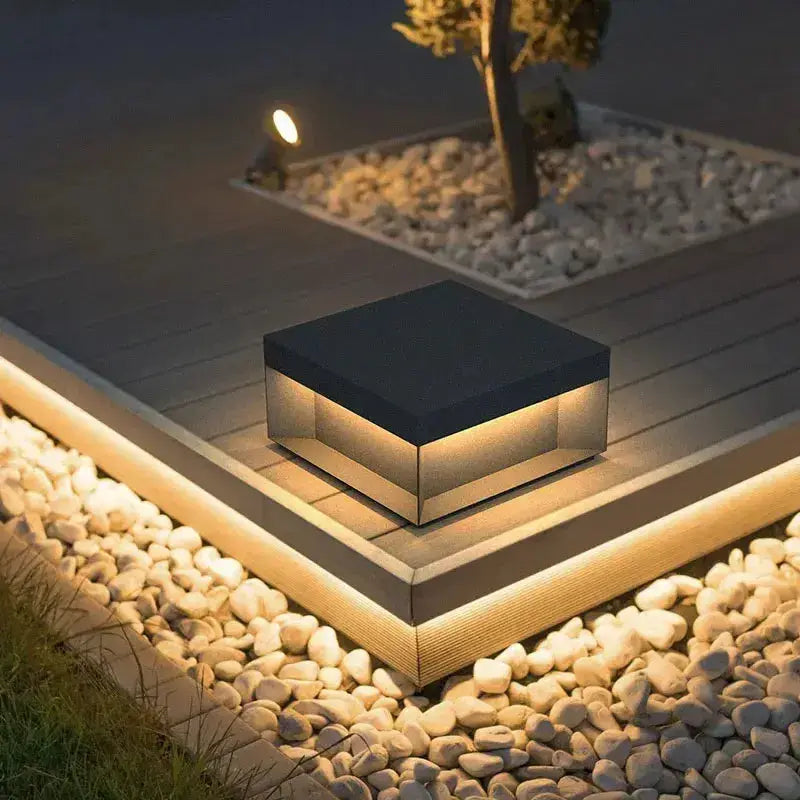 Black square solar LED pillar light by Decorbites for courtyard fence cap with warm glow on Tampa Home & Garden Store
