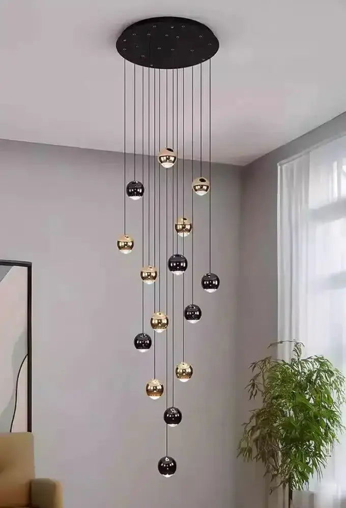 Decorbites modern black and gold globe pendant chandelier with multiple hanging spheres on Tampa Home & Garden Store