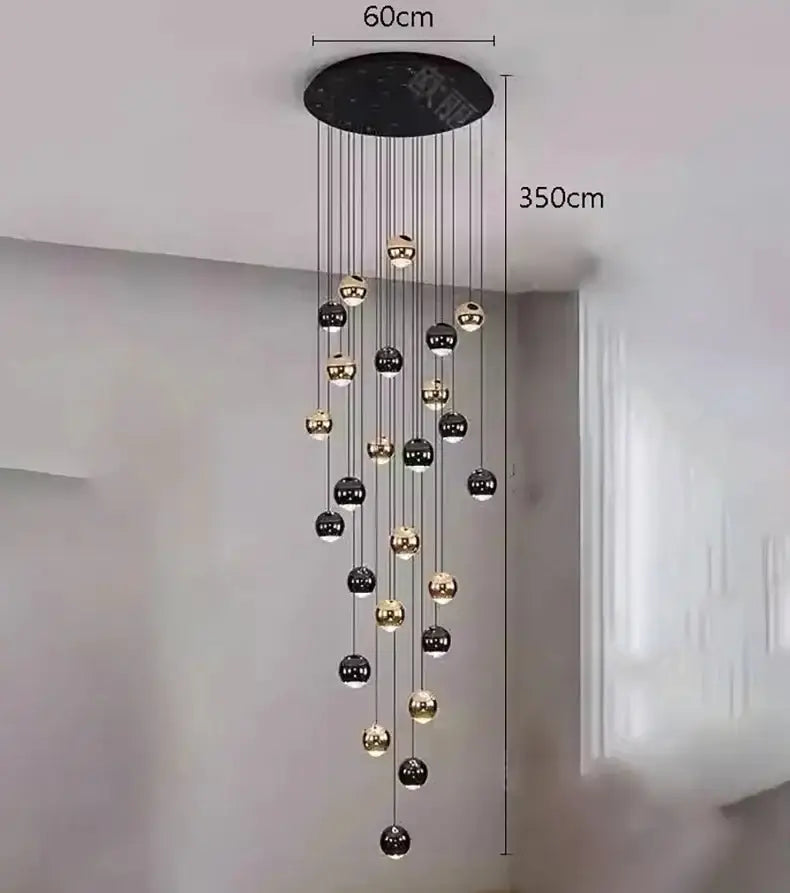 Modern black and gold globe pendant chandelier with multiple hanging orbs for dining room on Tampa Home & Garden Store