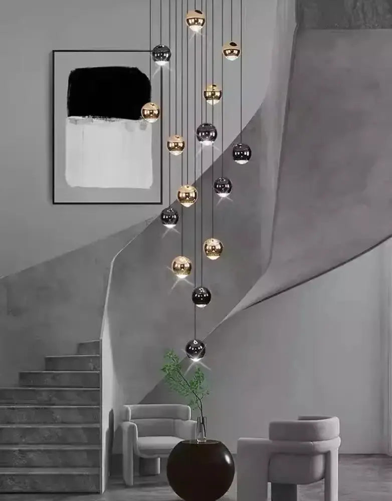 Modern black and gold globe pendant chandelier with multiple heads by Decorbites on Tampa Home & Garden Store