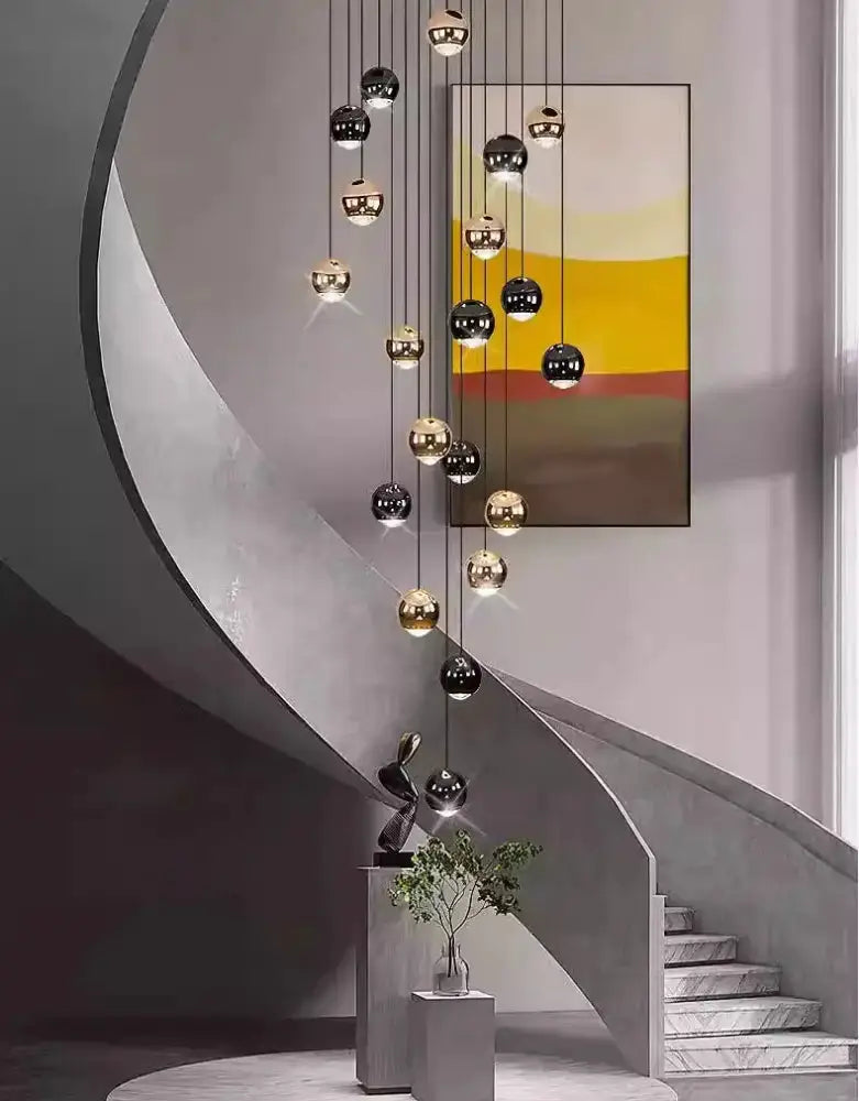 Decorbites black and gold globe pendant chandelier with multiple hanging spheres on Tampa Home & Garden Store