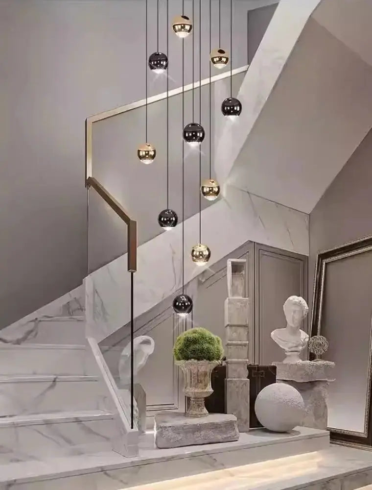 Globe pendant chandelier by Decorbites, modern black and gold with multiple hanging heads on Tampa Home & Garden Store