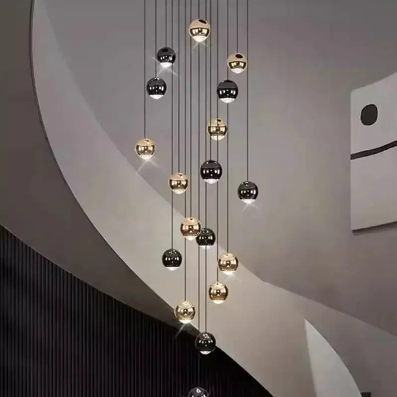 Modern black and gold globe pendant chandelier with multiple hanging heads Decorbites on Tampa Home & Garden Store