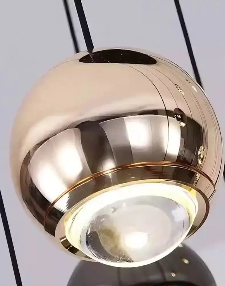 Decorbites modern globe pendant light in black and gold with multiple heads on Tampa Home & Garden Store