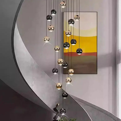 Decorbites globe pendant chandelier in black and gold with multiple hanging spheres on Tampa Home & Garden Store