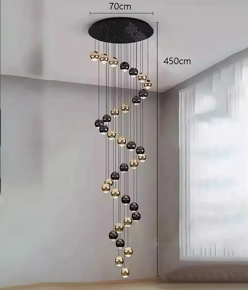 Modern black and gold globe pendant chandelier by Decorbites with cascading spheres on Tampa Home & Garden Store