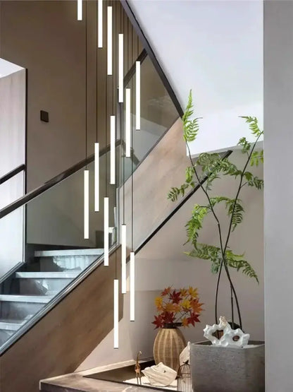 Modern black LED spiral staircase chandelier with vertical pendant bars by Decorbites on Tampa Home & Garden Store