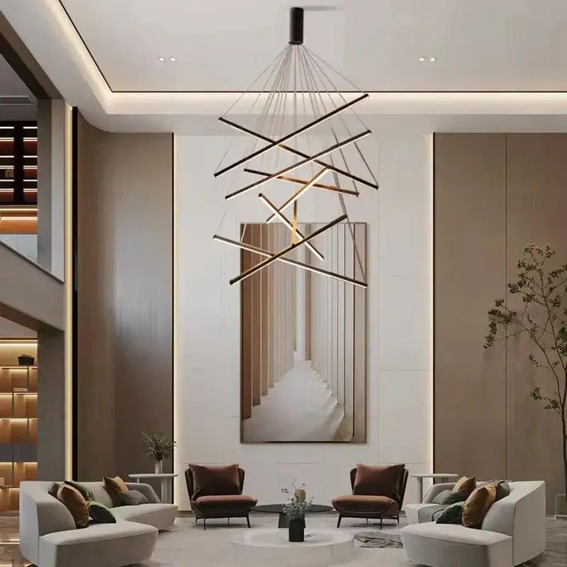 Gold Stair Chandelier Light with geometric brass rod frame by Decorbites over a modern living room on Tampa Home & Garden Store
