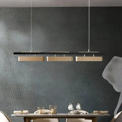 Chandelier Decorbites slim LED black and gold pendant lights with 3 blocks above table on Tampa Home & Garden Store