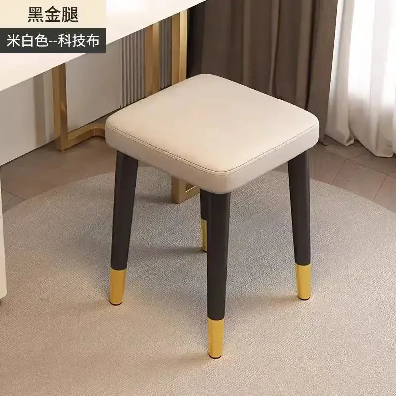 Low square dining stool by Decorbites cream upholstered seat and dark legs with yellow tips on Tampa Home & Garden Store