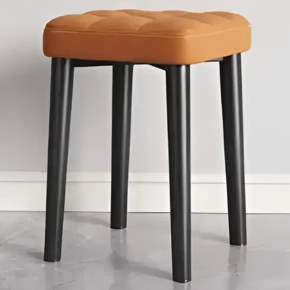 Modern low square dining stool with tan upholstered seat and black legs by Decorbites on Tampa Home & Garden Store