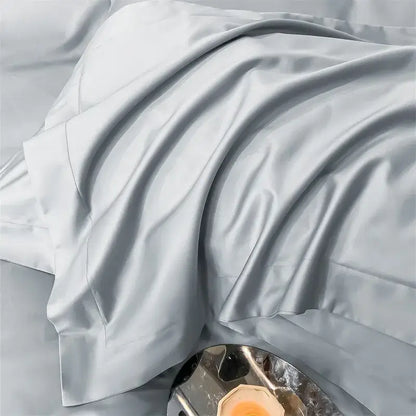 Gray Satin Bedding Set And A Soft Cotton Sheet
