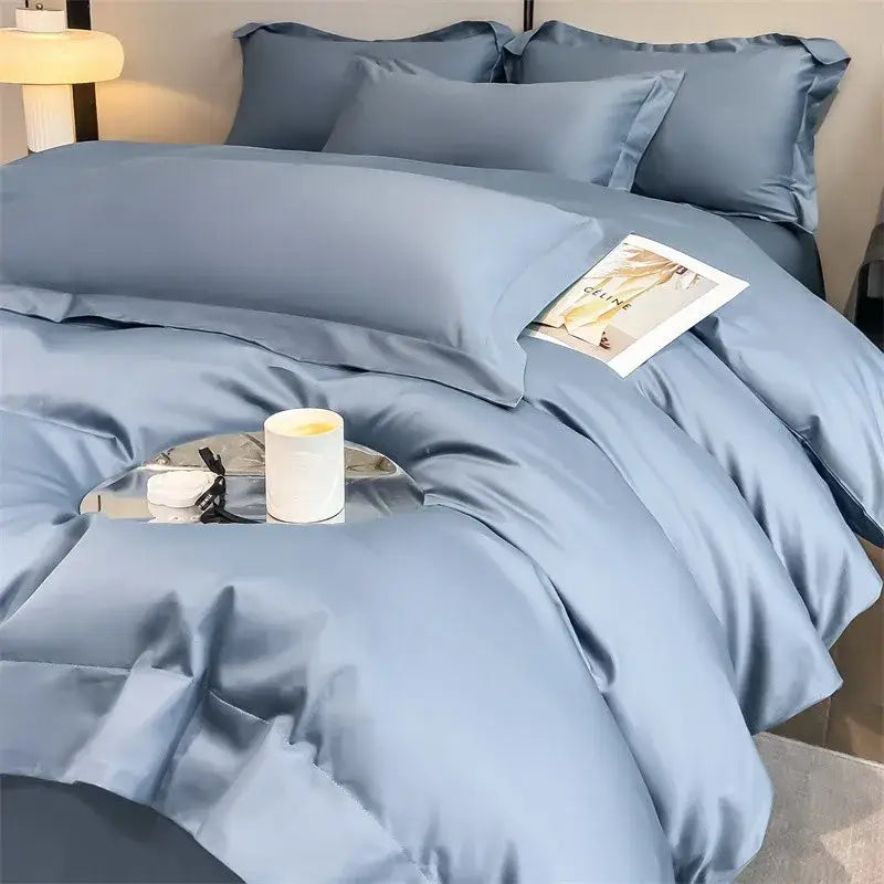 Sky Blue Satin Duvet Cover Set by Decorbites with matching pillowcases on bed on Tampa Home & Garden Store