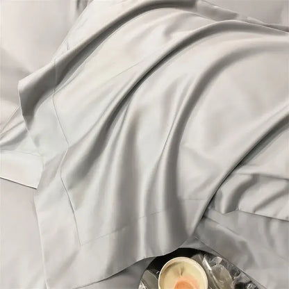 Gray Satin Bedding Set And A Soft Cotton Sheet