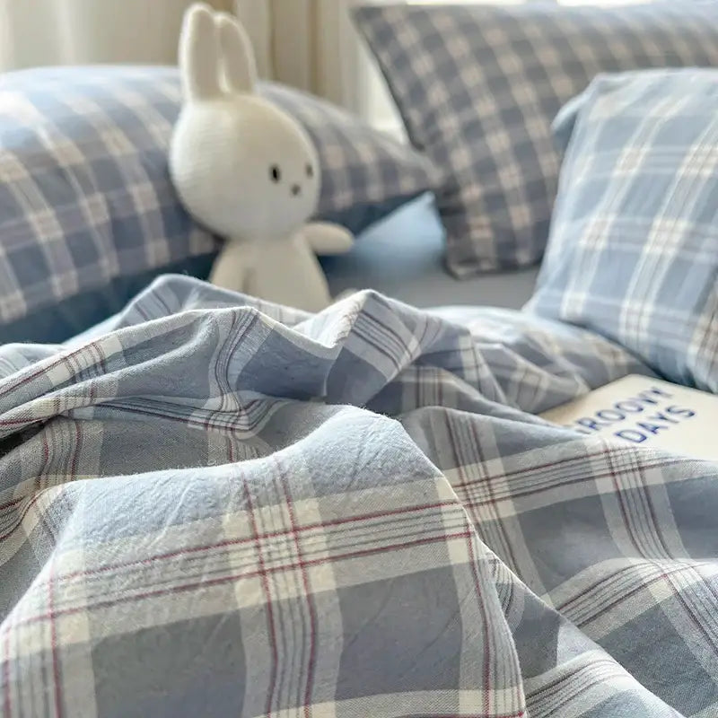 Blue Plaid Duvet Set by Decorbites with matching pillowcases on a bed on Tampa Home & Garden Store
