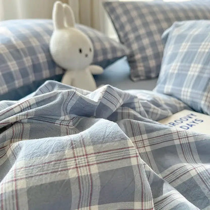 Blue Plaid Duvet Set by Decorbites with matching pillowcases on a bed on Tampa Home & Garden Store