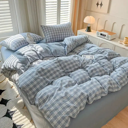 Blue Plaid Duvet Set by Decorbites on bed with matching plaid pillow shams on Tampa Home & Garden Store