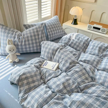 Blue Plaid Duvet Set by Decorbites with matching plaid pillow shams on bed on Tampa Home & Garden Store