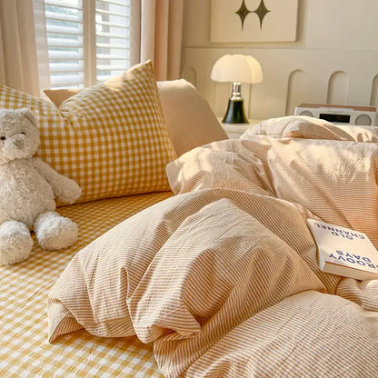 Blue Plaid Duvet Set by Decorbites on bed with yellow gingham cushions and cream duvet on Tampa Home & Garden Store