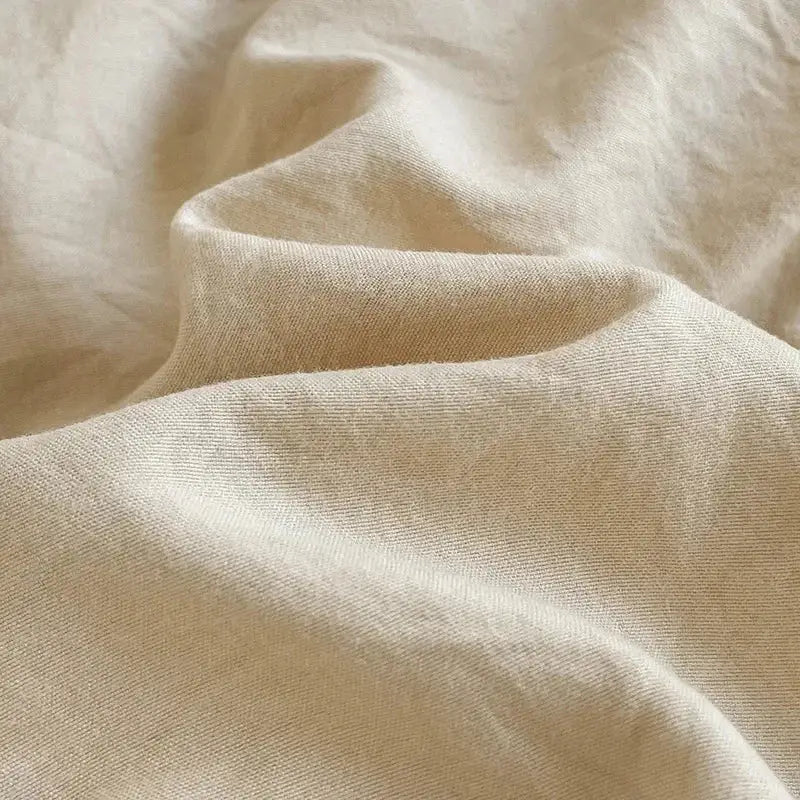 Cream cotton duvet cover by Decorbites, soft textured bedding fabric folds on Tampa Home & Garden Store
