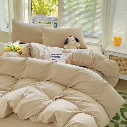 Luxurious cream cotton duvet cover set by Decorbites on bed with beige pillows on Tampa Home & Garden Store