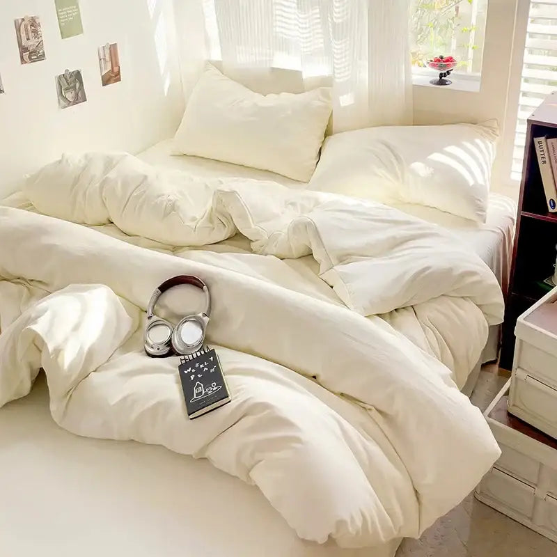Luxurious cream cotton duvet cover set by Decorbites in a bright cozy bedroom on Tampa Home & Garden Store