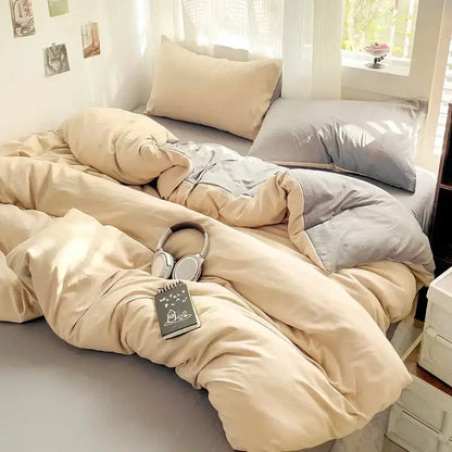 Cream cotton duvet cover set by Decorbites on bed with beige comforter and gray pillow shams on Tampa Home & Garden Store