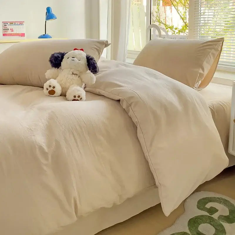 Luxurious cream cotton duvet cover set by Decorbites on a bed in a bright bedroom on Tampa Home & Garden Store