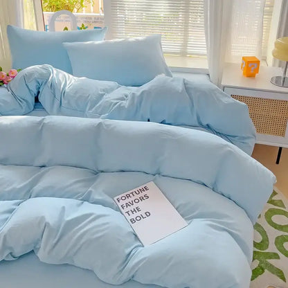 Light blue cotton duvet cover bedding set on a neatly made bed in a bright room on Tampa Home & Garden Store