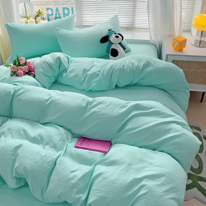 Decorbites cream cotton duvet cover set on mint teal bed with panda plush and pink flowers on Tampa Home & Garden Store