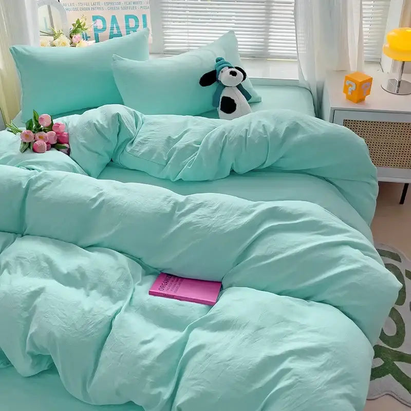 Decorbites mint green cotton duvet cover bedding set on bed with pillows and panda plush on Tampa Home & Garden Store