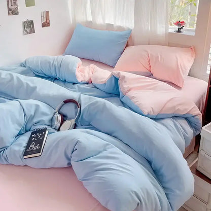 Decorbites duvet cover set cream cotton with blue and pink accents on bed on Tampa Home & Garden Store