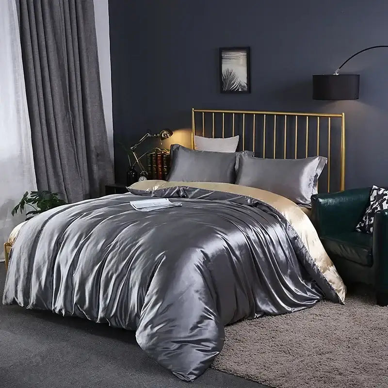 Turquoise satin duvet cover set by Decorbites on bed with gray pillows and gold headboard on Tampa Home & Garden Store