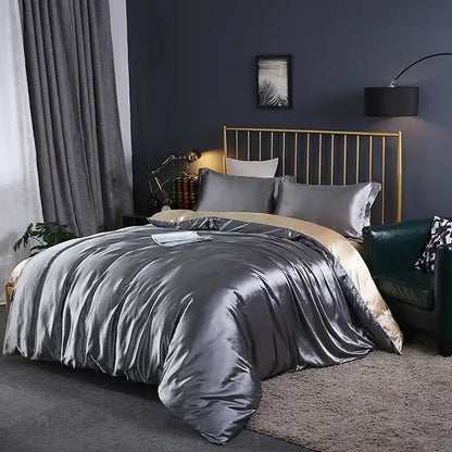Turquoise satin duvet cover set by Decorbites on bed with gray pillows and gold headboard on Tampa Home & Garden Store