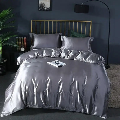 Gray Silk Duvet Cover set by Decorbites with matching pillowcases on bed on Tampa Home & Garden Store