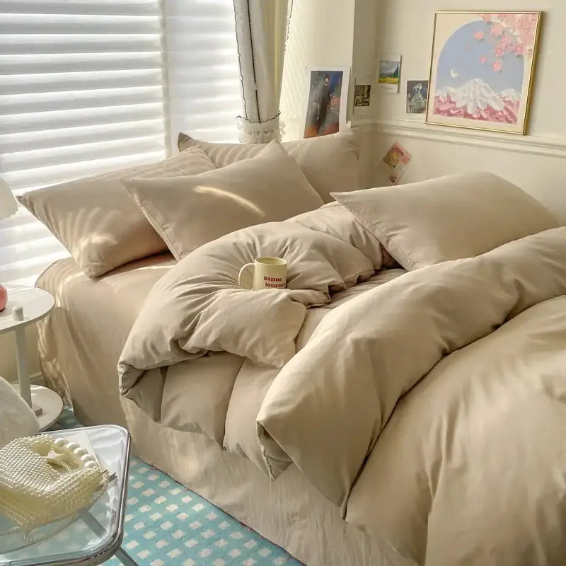 Decorbites duvet cover bedding set in beige cream with fluffy pillows on a cozy bedroom bed on Tampa Home & Garden Store