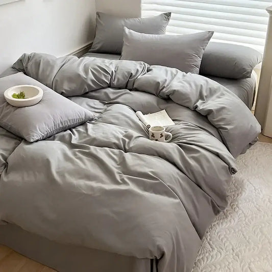 Luxurious gray cotton bedding duvet set with matching pillows by Decorbites on bed on Tampa Home & Garden Store