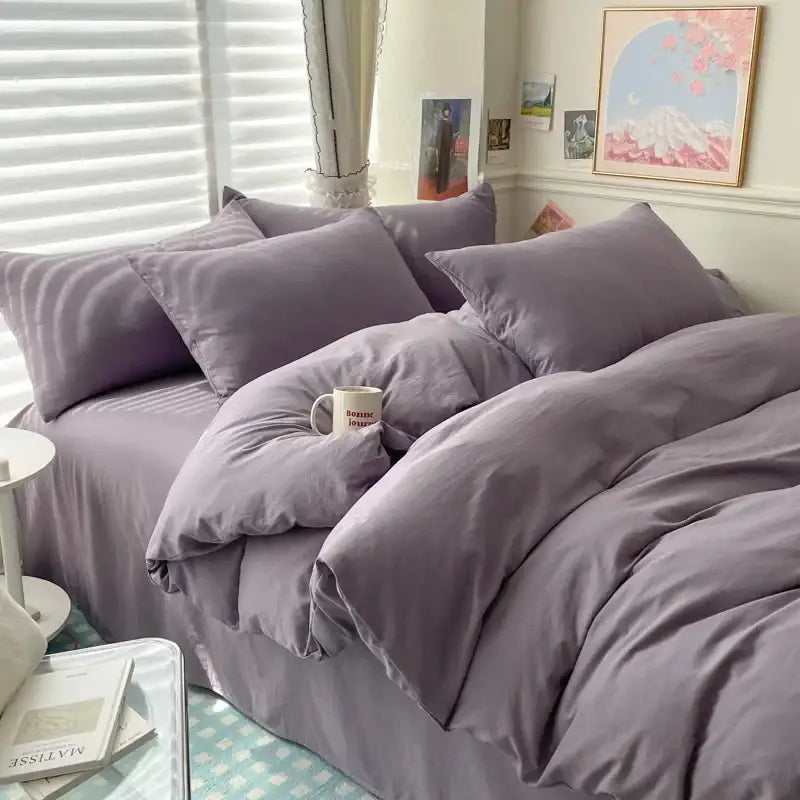 Decorbites lavender duvet cover bedding set with pillows on a bed in a cozy bedroom on Tampa Home & Garden Store