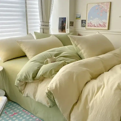 Decorbites white and dark gray duvet cover bedding set on a plush bed with pale pillows in a bright bedroom on Tampa Home & Garden Store