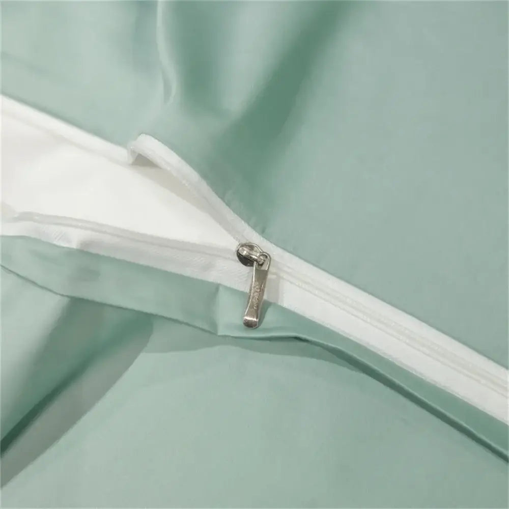 Duvet cover zipper closeup on mint green egyptian cotton fabric Decorbites on Tampa Home & Garden Store