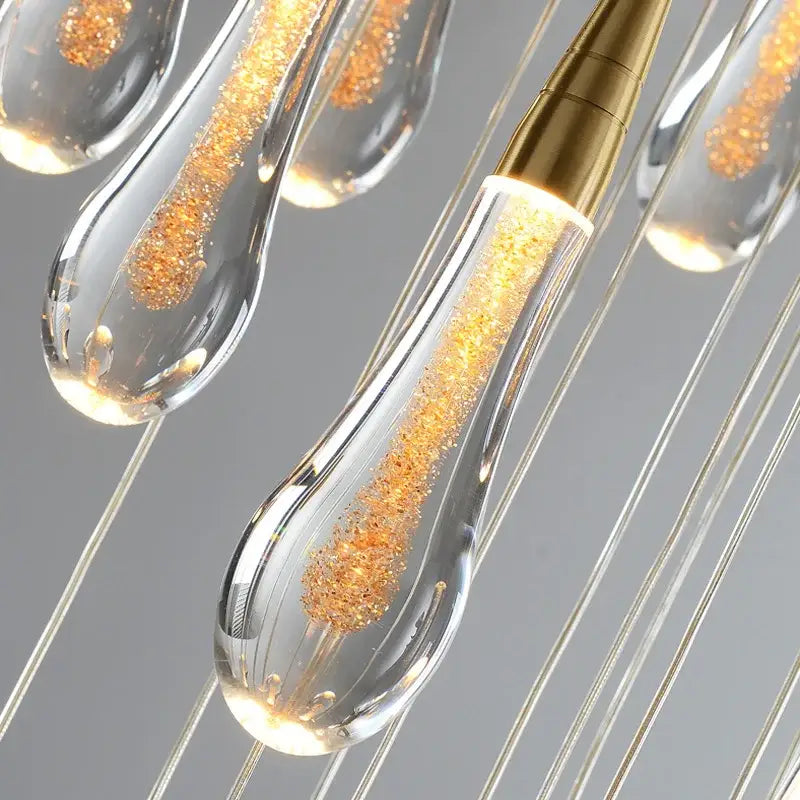 Gold teardrop chandelier glass droplets with glitter interior Decorbites on Tampa Home & Garden Store